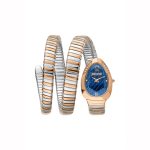 Iconic Fluidity. Radiant Contrast. Redefine your style with the Just Cavalli Azure Serpent, now available at ZAMANKO. This timepiece is a masterpiece of Italian flair, featuring a unique "S" shaped case that mirrors the iconic curves of the Cavalli serpent. The warm rose gold-tone bezel wraps around a stunning midnight blue sunray dial, creating a high-contrast look that captures the mystery and depth of the Mediterranean sea.